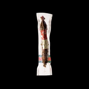 Caña de lomo ibérico de bellota envasada al vacío con etiqueta roja, un embutido que complementa los Jamones Ibéricos de Bellota y Embutidos Gourmet