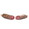 Salchichón ibérico curado partido por la mitad, un embutido tradicional que complementa los Jamones Ibéricos de Bellota y Embutidos Gourmet